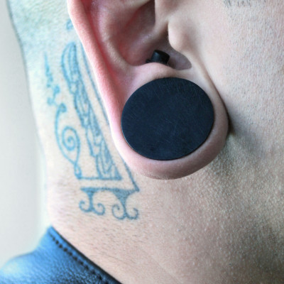 Marcello, Custom Opal Ear Piercing